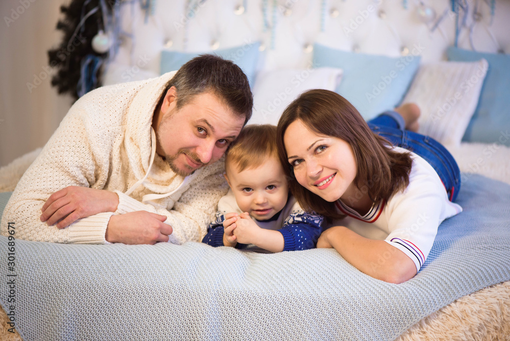 Fototapeta premium Beautiful family enjoying their holiday time together and having fun