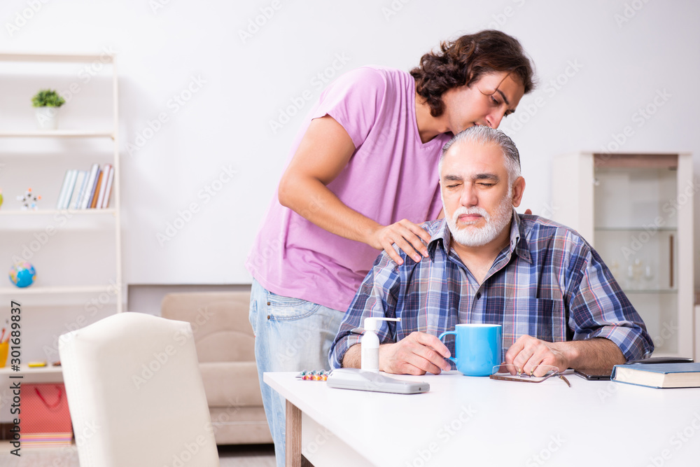 Young student and his old grandpa at home