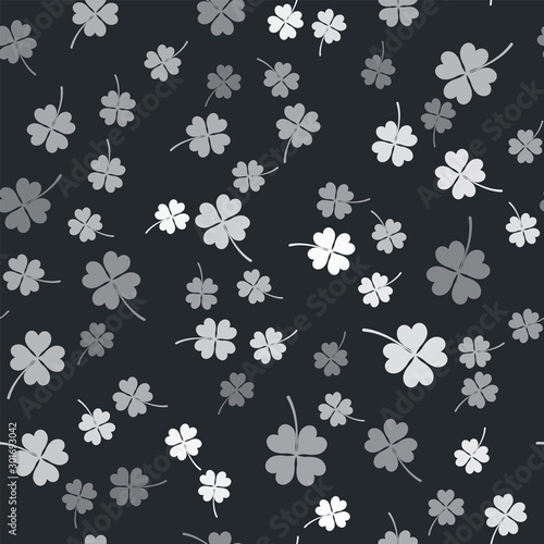 Grey Four leaf clover icon isolated seamless pattern on black background. Happy Saint Patrick day. Vector Illustration