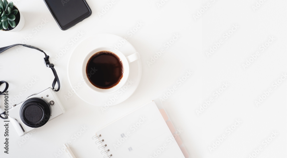 top view of office desk table with coffee cup, keyboard and notebook on white background, graphic designer, Creative Designer concept. top view of office desk table with coffee cup, keyboard and notebook on white background, graphic designer, Creative Designer concept.