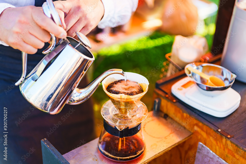 Japanese barista is brewing the drip coffee outdoor