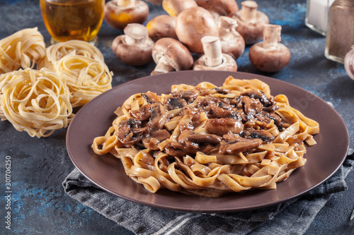 Tagliatelle pasta with champignion mushrooms