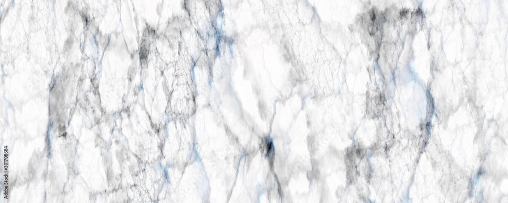 Fototapeta premium White marble texture featuring natural grey veins provides a clean elegant background for modern interior design projects.