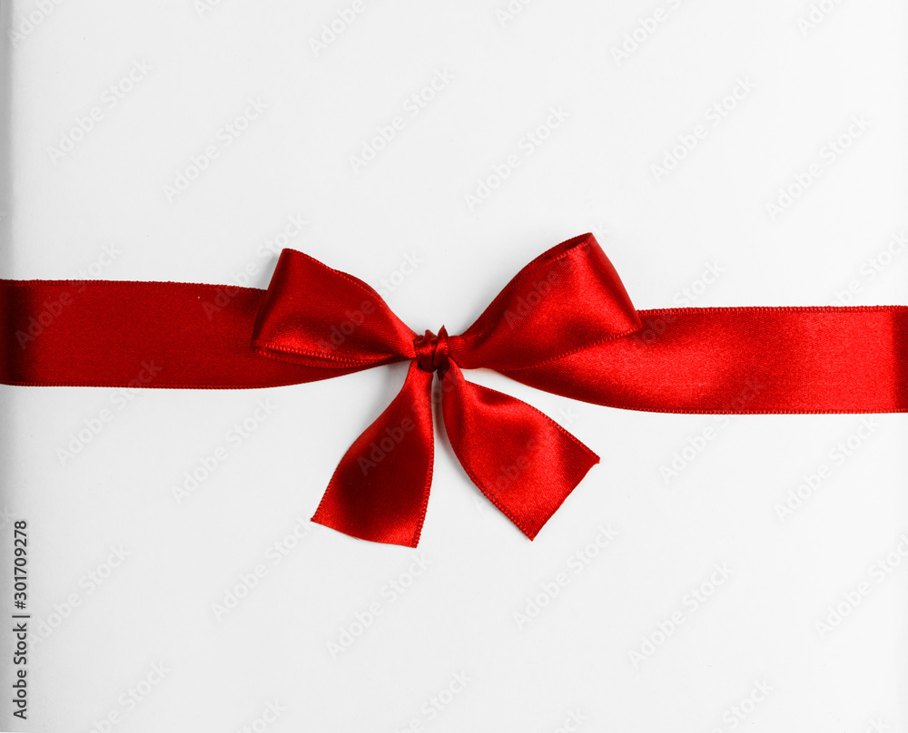 Red ribbon bow isolated on white Red ribbon bow isolated on white