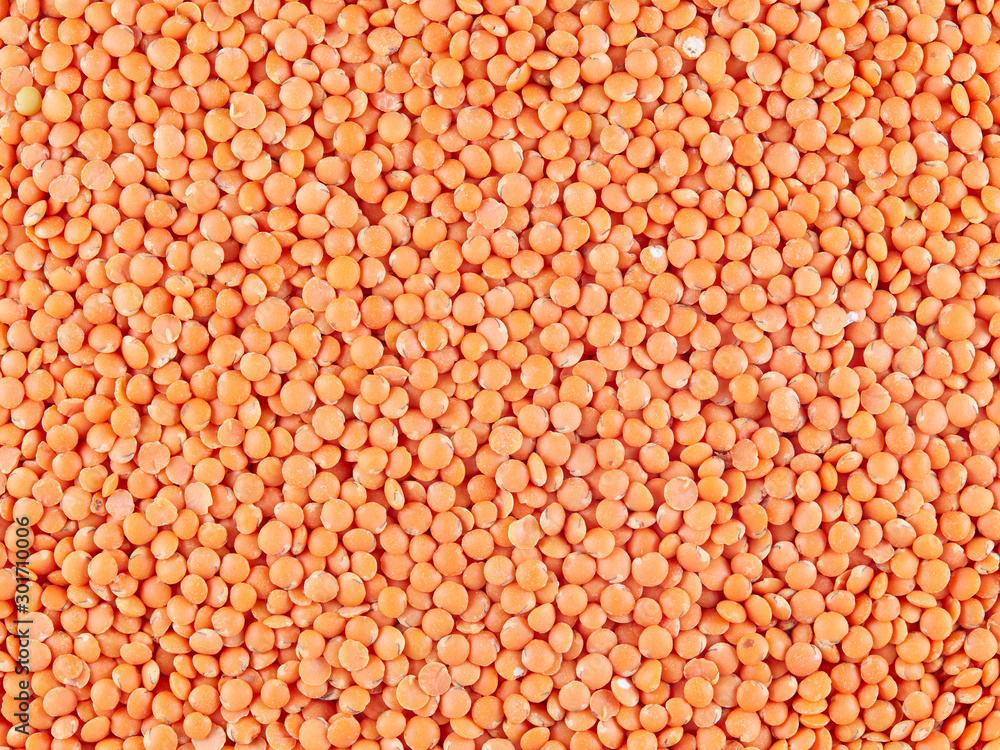 Red lentils. Top view. Texture and background. Red lentils. Top view. Texture and background.