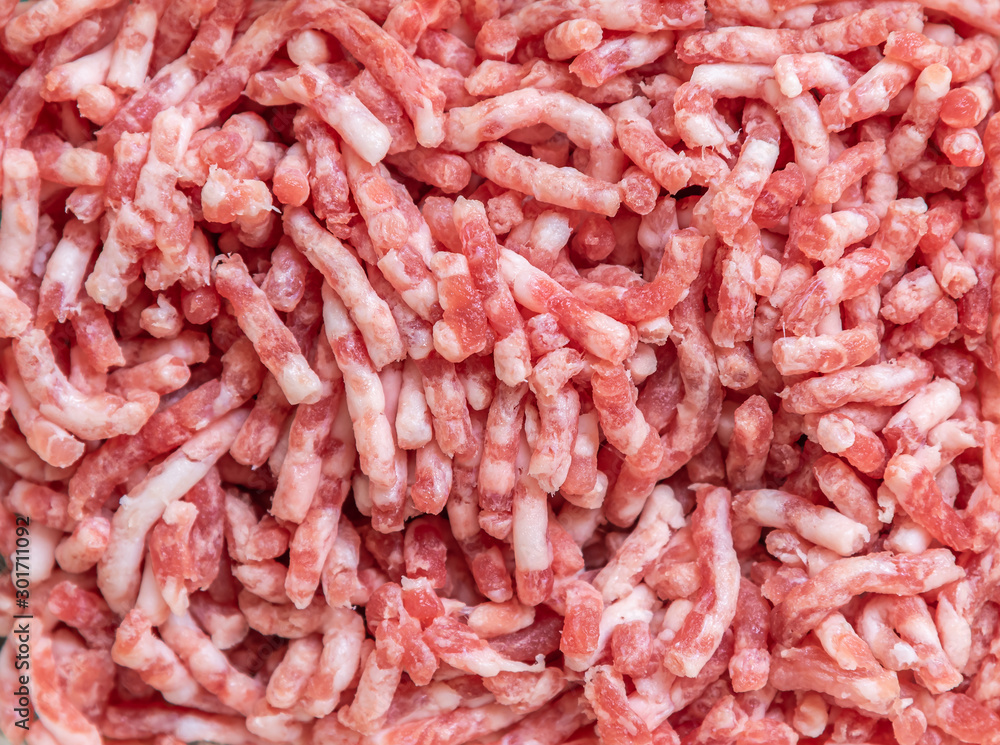 Raw food minced pork meat top view close up image. Raw food minced pork meat top view close up image.
