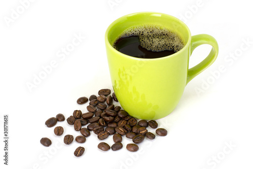 Black coffee in green ceramic cup and coffee beans isolated on white background. 