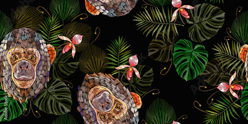 Chimpanzee head, palm leaves and orchid flowers horizontal seamless pattern. Monkey face. Jungle style. Embroidery animals art. Template of clothes, tapestry, t-shirt design