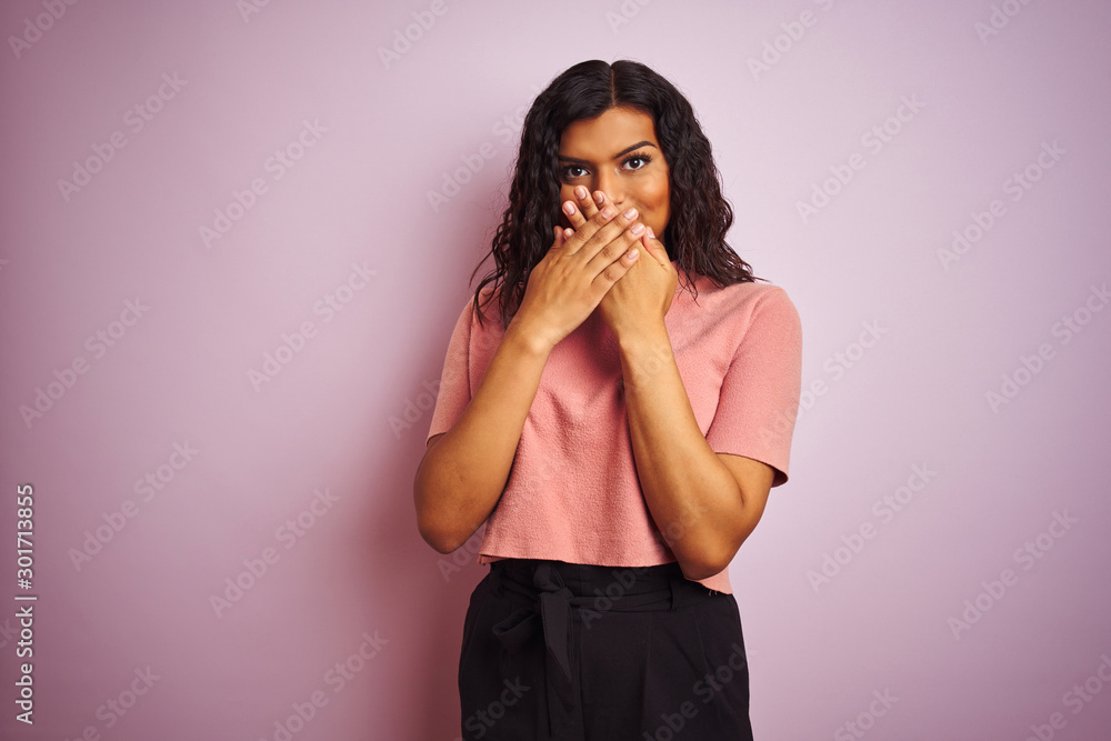 Young beautiful transsexual transgender elegant woman over isolated pink background shocked covering mouth with hands for mistake. Secret concept. Young beautiful transsexual transgender elegant woman over isolated pink background shocked covering mouth with hands for mistake. Secret concept.