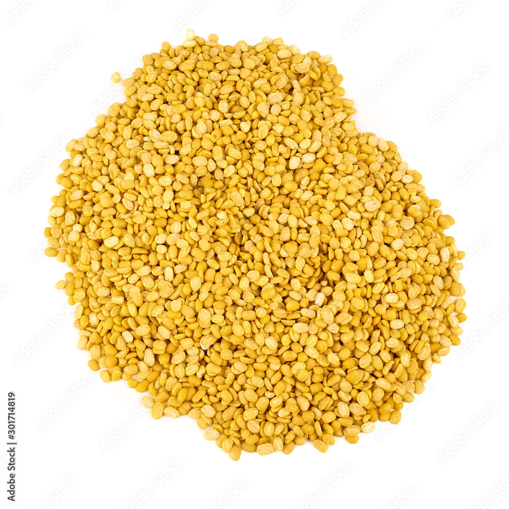 peeled split mung bean in wooden scoop isolated on white background.Ingredients for cooking Healthy and Natural Food concept peeled split mung bean in wooden scoop isolated on white background.Ingredients for cooking Healthy and Natural Food concept