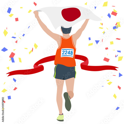 Man running at the finish line. Sportsman crossing the finish line first