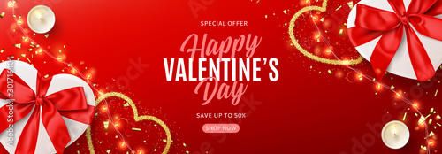 Valentine's Day sale horizontal banner. Vector illustration with realistic white gift boxes, sparkling light garland, candles and confetti on red background. Promo discount banner.