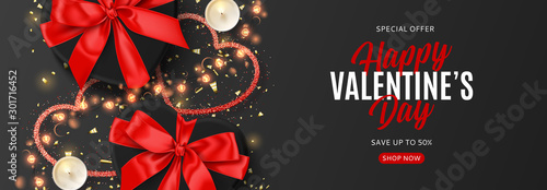 Valentine's Day sale background. Vector illustration with realistic black gift boxes, sparkling light garland, candles and confetti on black background. Promo discount banner.