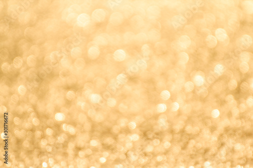 Abstract yellow or gold bokeh celebration background 