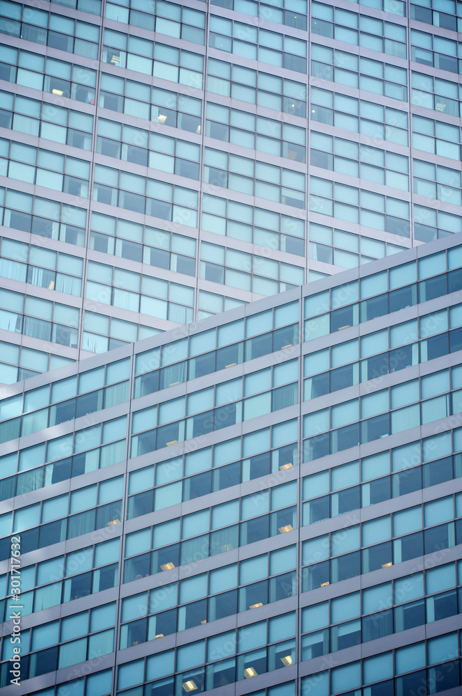 Abstract geometric background of a modern glass office tower skyscraper Abstract geometric background of a modern glass office tower skyscraper