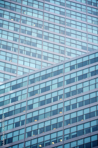 Abstract geometric background of a modern glass office tower skyscraper 