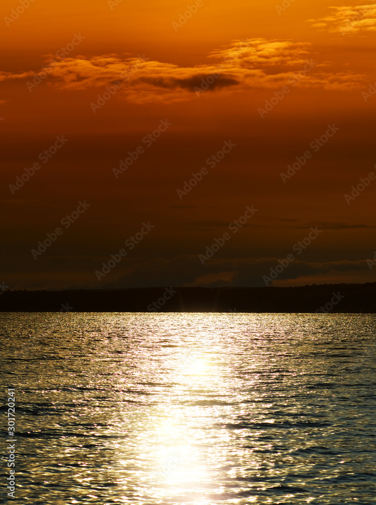 Burning sunset at evening river landscape background