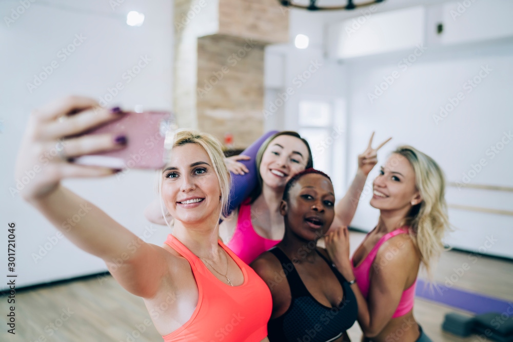 Multiethnic funny women taking selfie Multiethnic funny women taking selfie