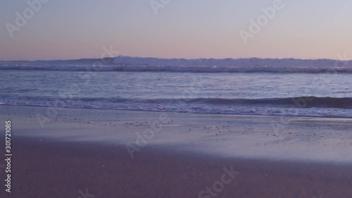 Wallpaper Mural Ocean Waves Crashing Upon the Beach At Sundown.  Slow Motion Wide Show at Low Angle Torontodigital.ca