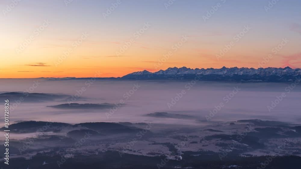 Sunrise over Tatra mountains seen from Babia mountain with cloud inversion. Sunrise over Tatra mountains seen from Babia mountain with cloud inversion.