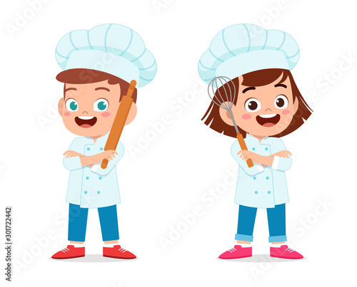 happy cute kid boy and girl in chef costume