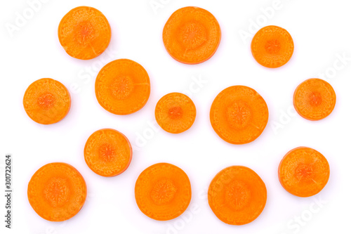 Fresh organic slice of carrot isolated on white background. Top view. Flat lay. 