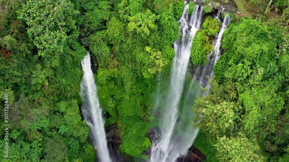 Sekumpul waterfall, Bali island, Indonesia. Aerial view on the waterfall in jungle. Natural landscape from air. Indonesia - video Sekumpul waterfall, Bali island, Indonesia. Aerial view on the waterfall in jungle. Natural landscape from air. Indonesia - video