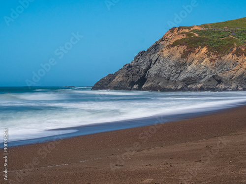 California Beach with long exposure to enjoy huge dangerous waves