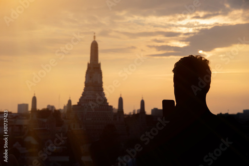 silhouette People  Viewpoint Wat Arun Buddhist temple in Bangkok Thailand.