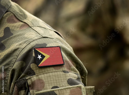 Flag of East Timor on military uniform. Army, troops, soldiers. Collage.