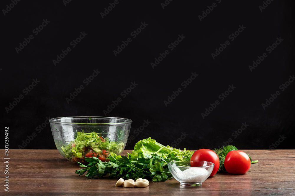 Ingredients for making salad, fresh vegetables on a wooden background. Ingredients for making salad, fresh vegetables on a wooden background.