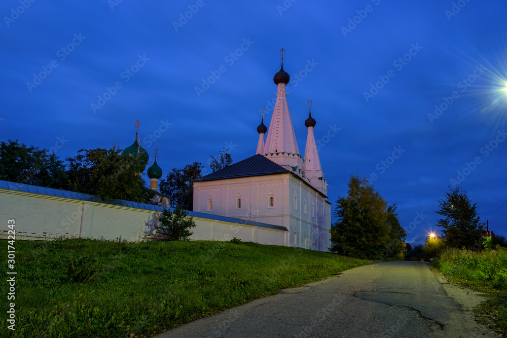 The Assumption Church illuminated by the last rays of the setting sun at dusk in the ancient town of Uglich Russia