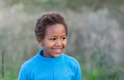 Happy african child with blue jersey