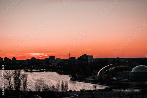 sunset over city © Adrian