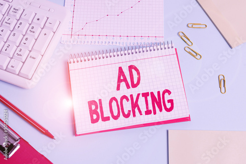 Handwriting text Ad Blocking. Conceptual photo program that will remove different kinds of advertising from web Paper blue desk computer keyboard office study notebook chart numbers memo