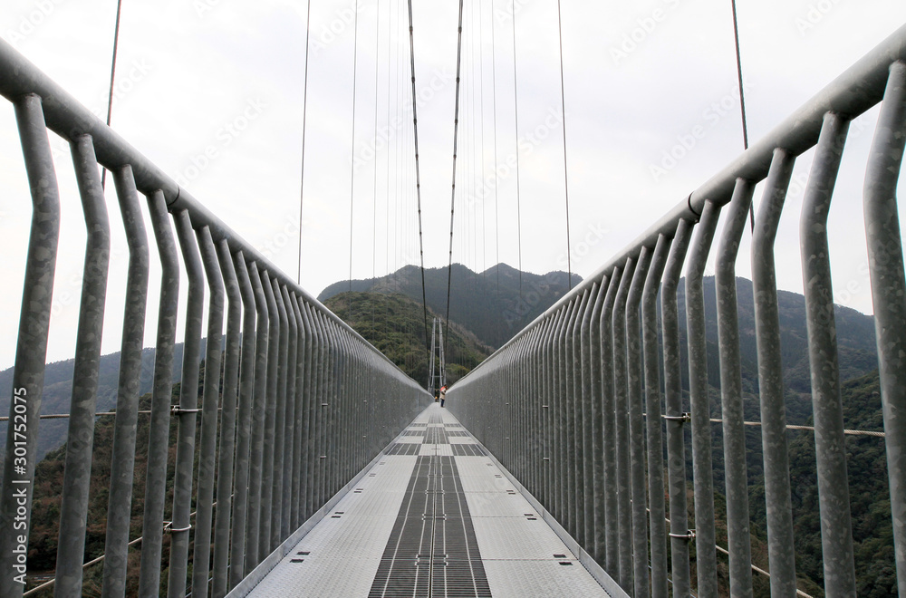Fototapeta premium Suspension bridge surrounded by canyons at Aya,Miyazaki