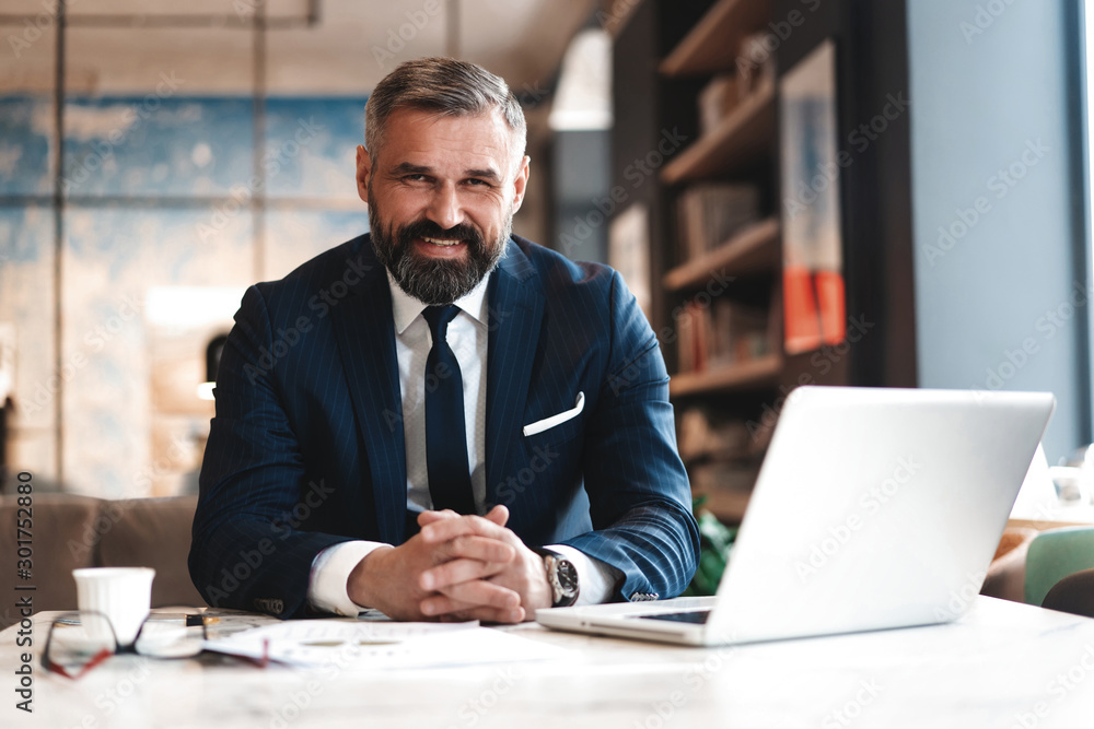 business man working with documents and laptop business man working with documents and laptop