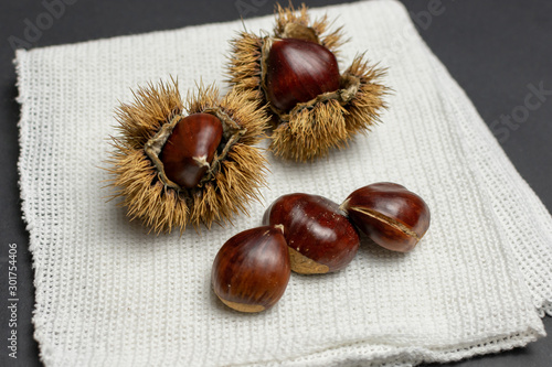 roasted chestnuts rag white black table stone
