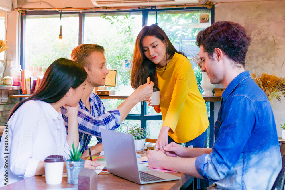 Group of businessman and businesswoman or friends or students meeting and discussing in casual to work in the project Group of businessman and businesswoman or friends or students meeting and discussing in casual to work in the project
