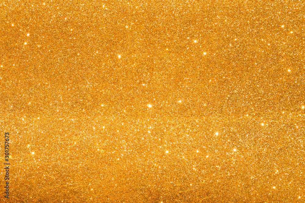 shine and sparkle of golden glitter abstract background shine and sparkle of golden glitter abstract background