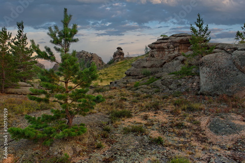 Eastern Kazakhstan. Summer evening in the mountains of Bayanaul national Park photo