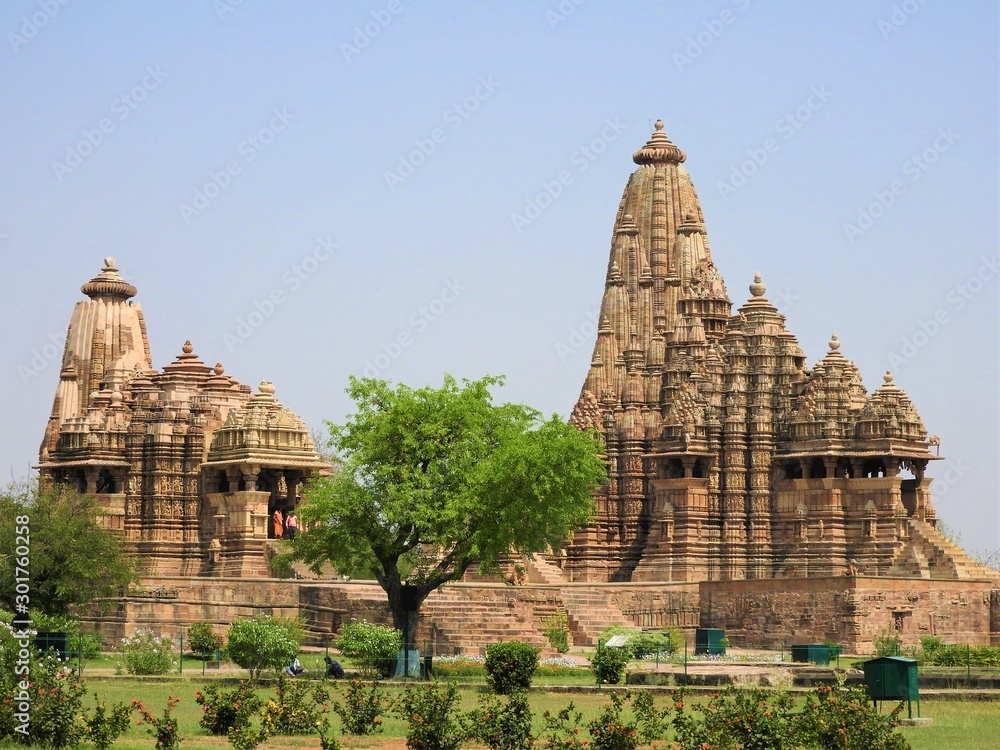Vintage retro effect filtered hipster style image of famous indian Madhya Pradesh tourist landmark - Kandariya Mahadev Temple, Khajuraho, India. Unesco World Heritage Site