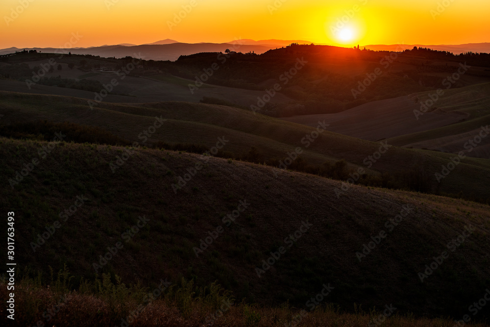 Landscape of the Siena hills at sunset