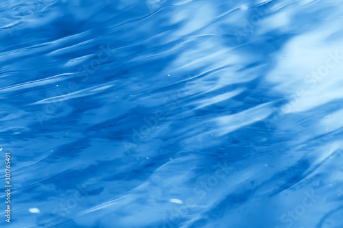 concept blue abstract background water / ocean, lake waves on water, reflection of ripples on the river