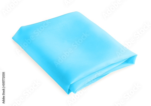 folded piece of light blue fabric isolated on white background