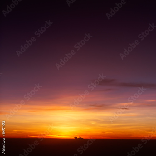 beautiful sunset sky nature background , warm tone sunset © Atip R