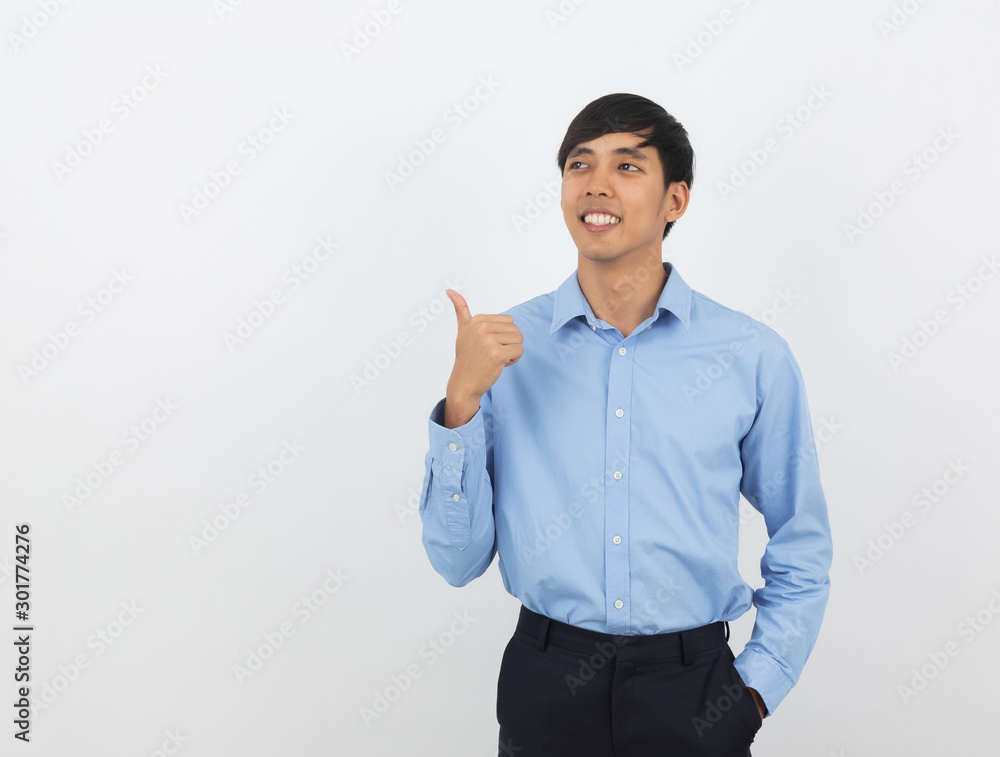 Young handsome asian business man smiling and showing thumbs up isolated on white background. Young handsome asian business man smiling and showing thumbs up isolated on white background.