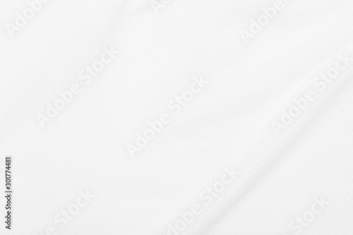 White fabric texture background with soft waves.