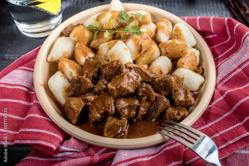 Beef stew with potatoes dumplings. Beef stew with potatoes dumplings.