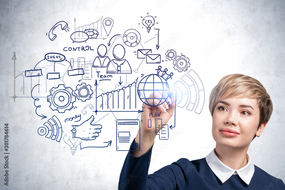 Smiling woman drawing business plan sketch Smiling woman drawing business plan sketch